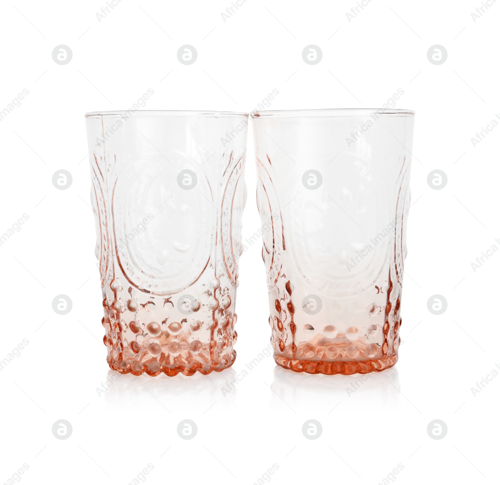 Photo of Two empty clean glasses isolated on white