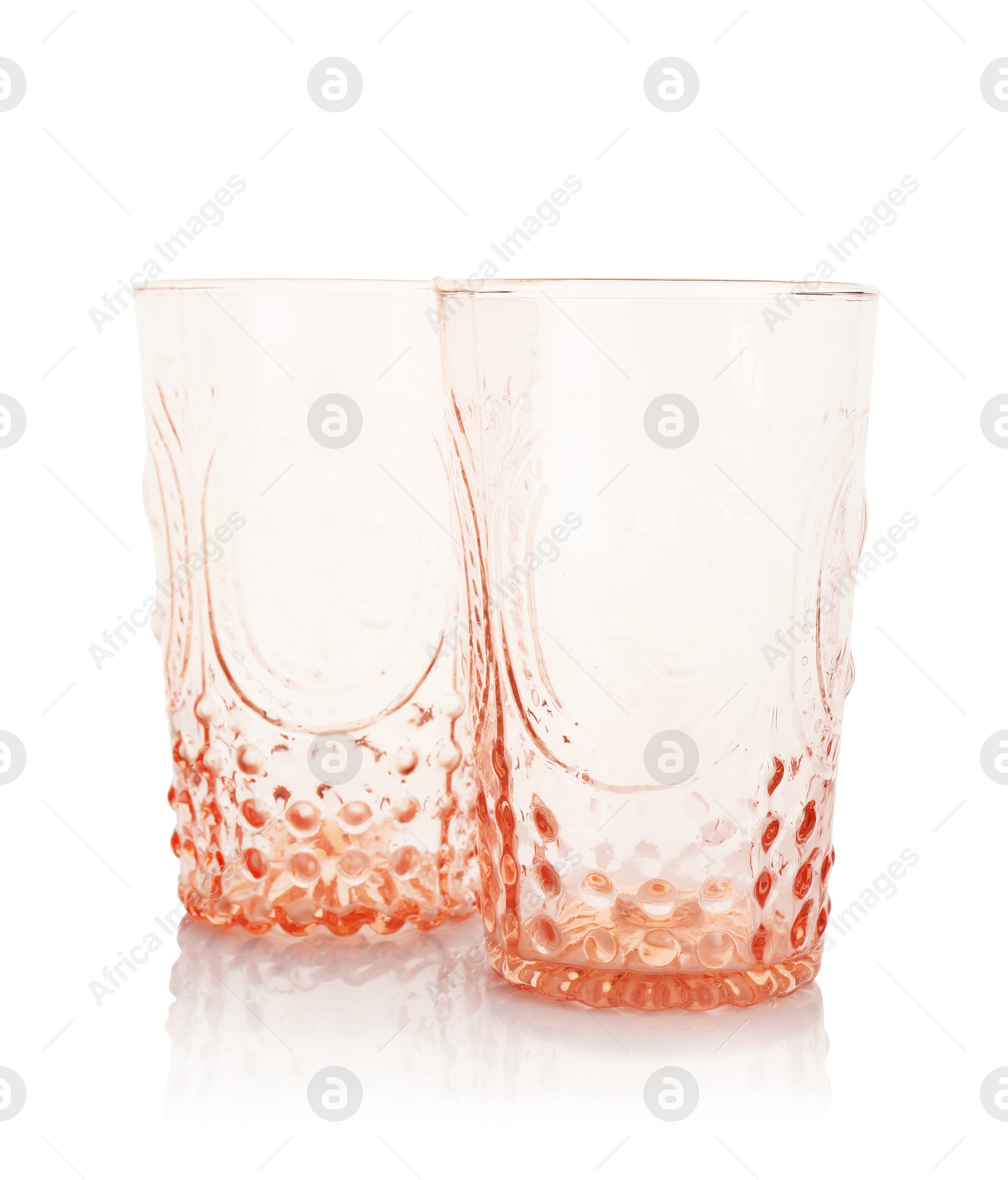 Photo of Two empty clean glasses isolated on white