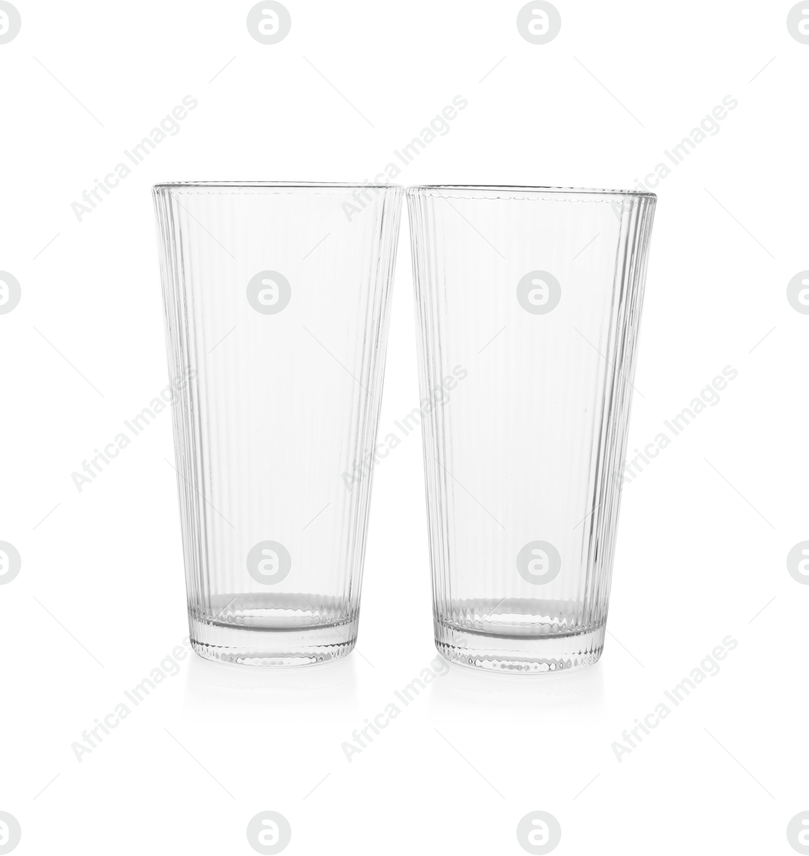 Photo of Two empty clean glasses isolated on white