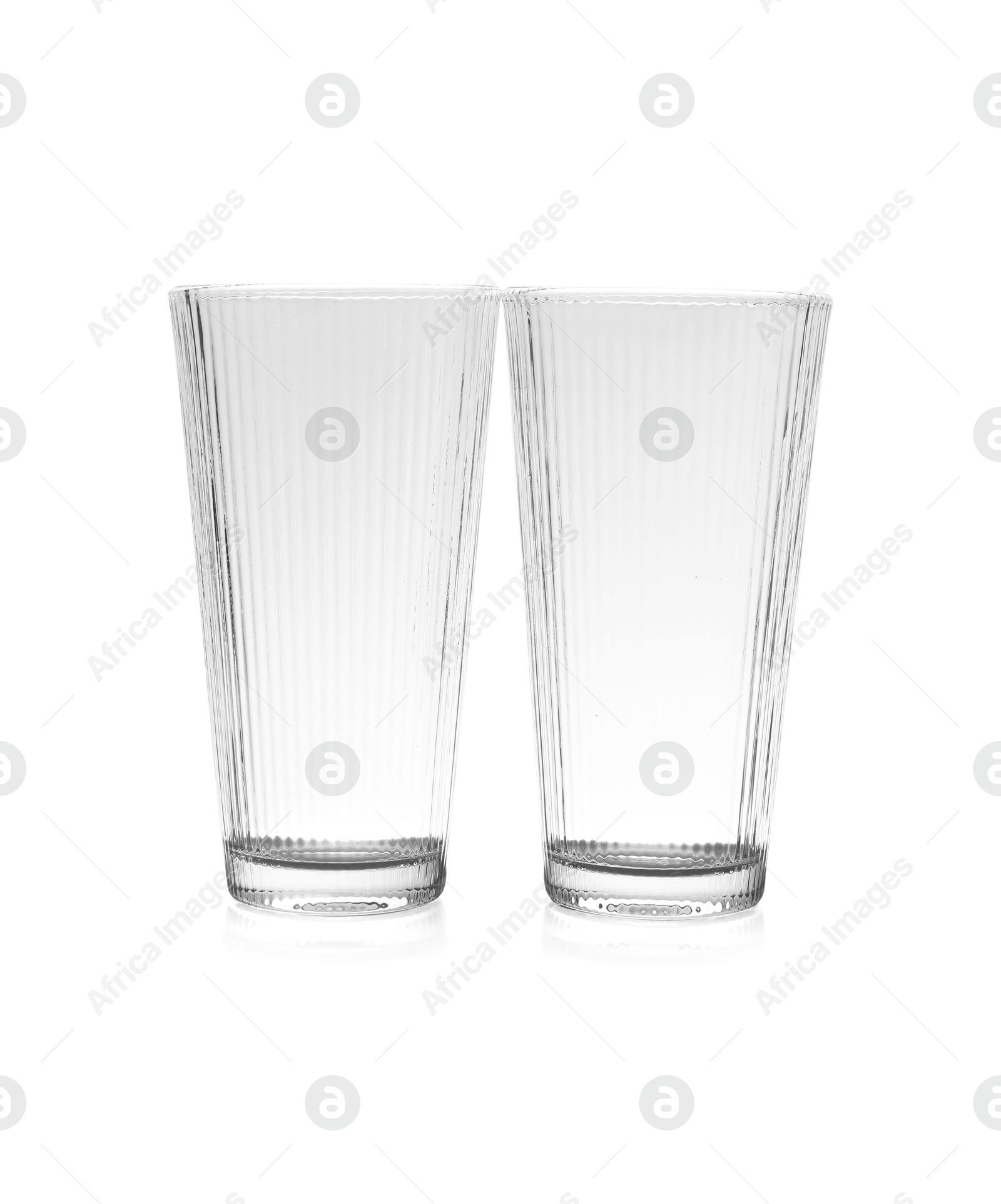 Photo of Two empty clean glasses isolated on white