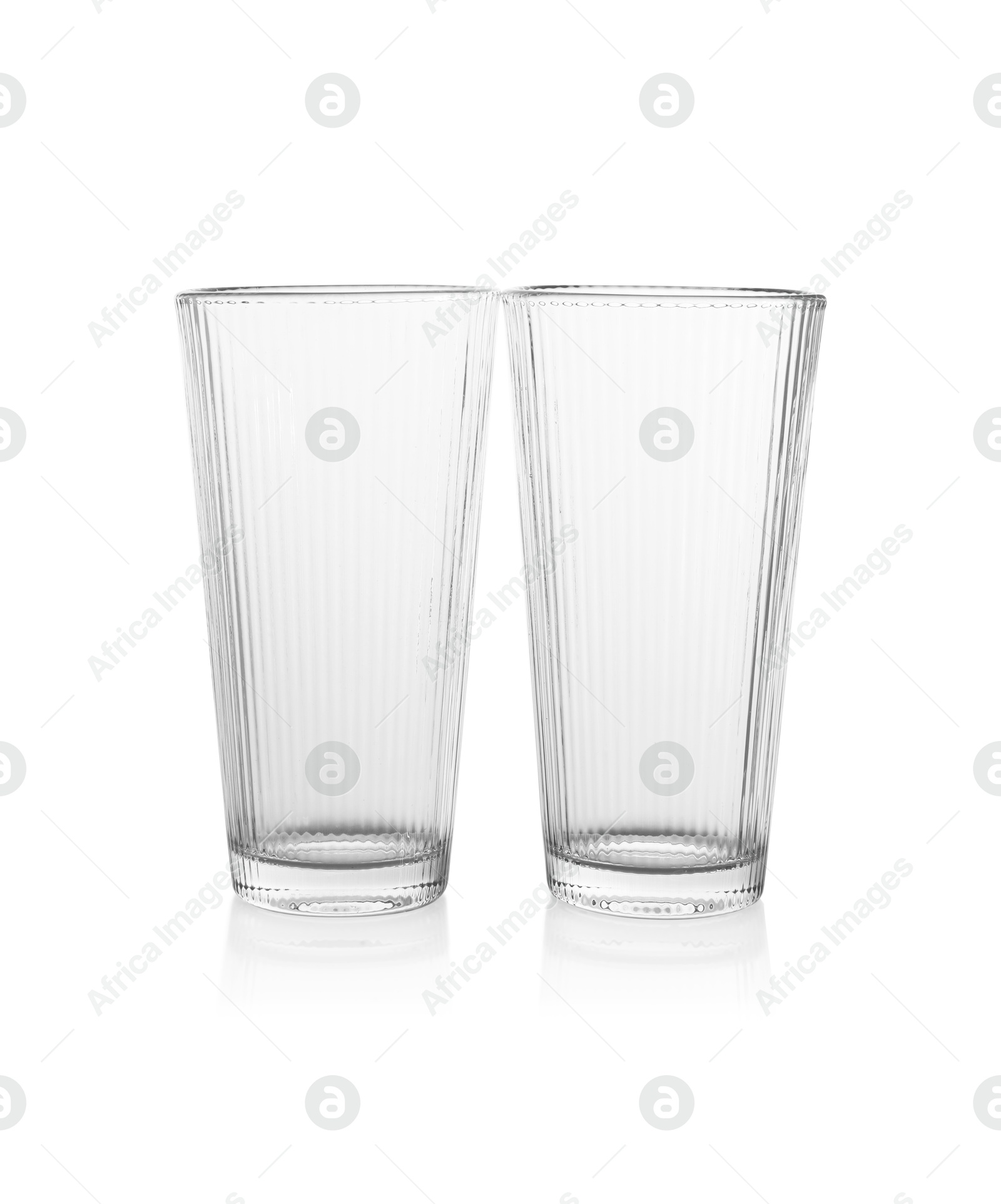 Photo of Two empty clean glasses isolated on white