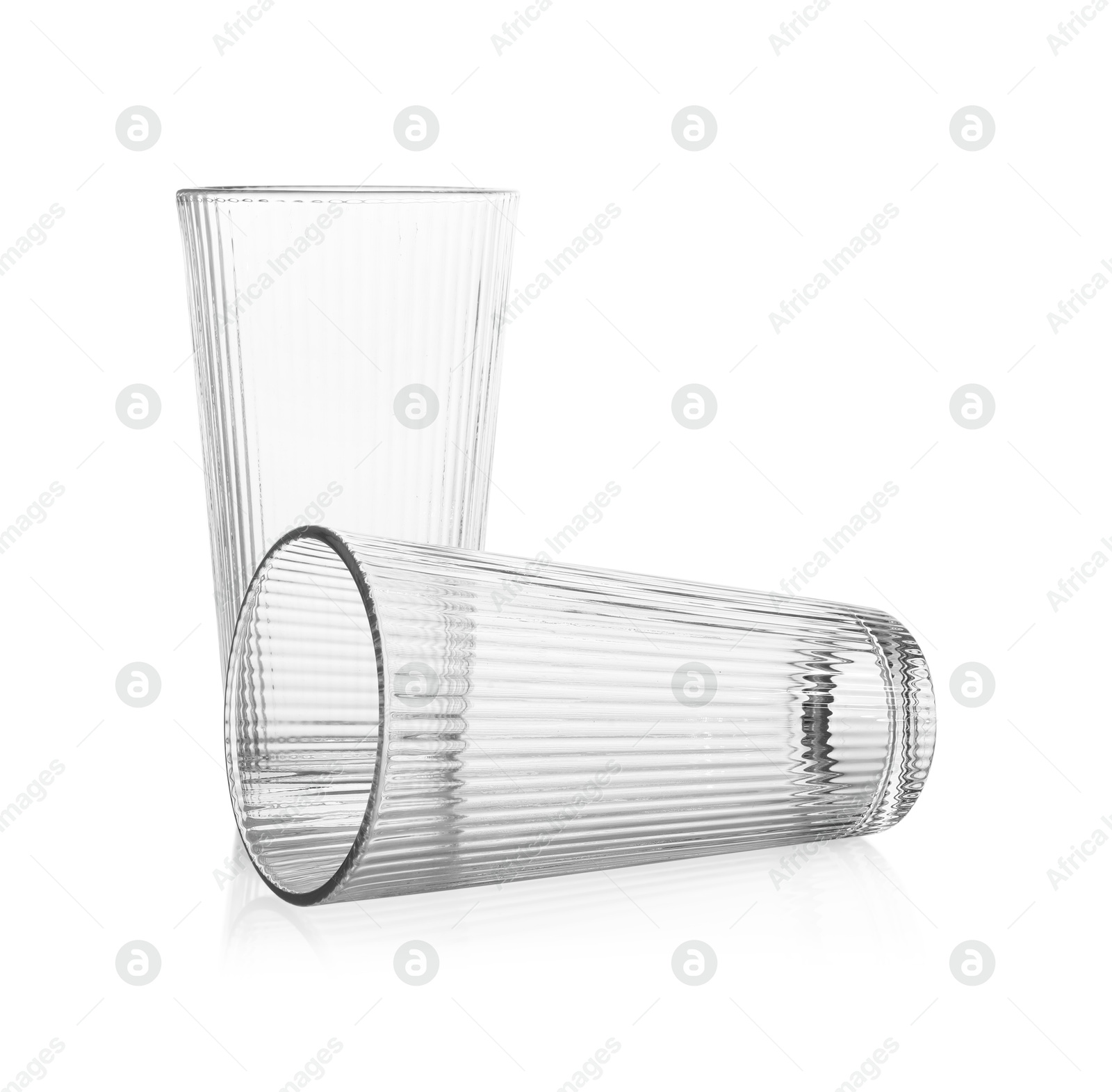 Photo of Two empty clean glasses isolated on white