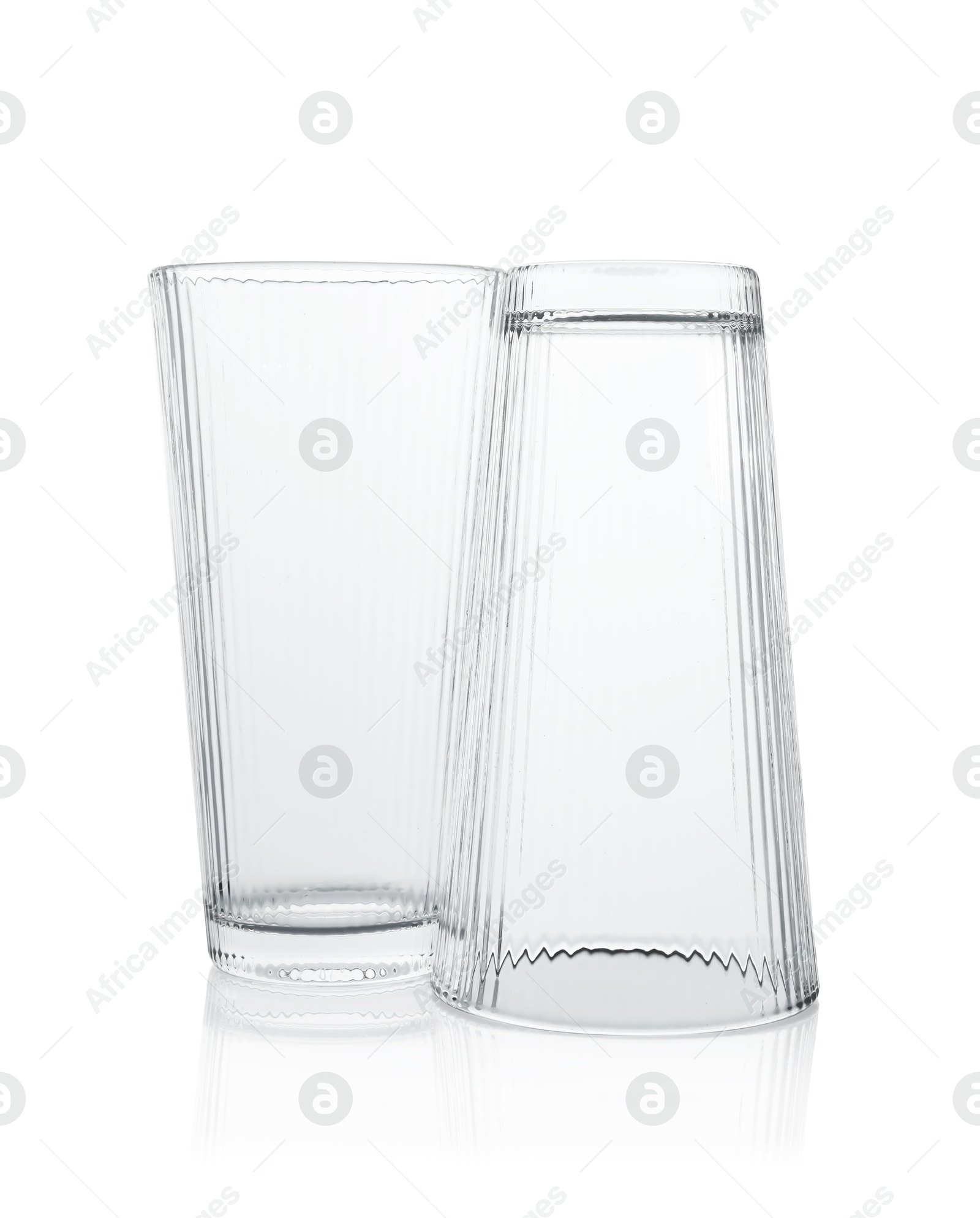 Photo of Two empty clean glasses isolated on white