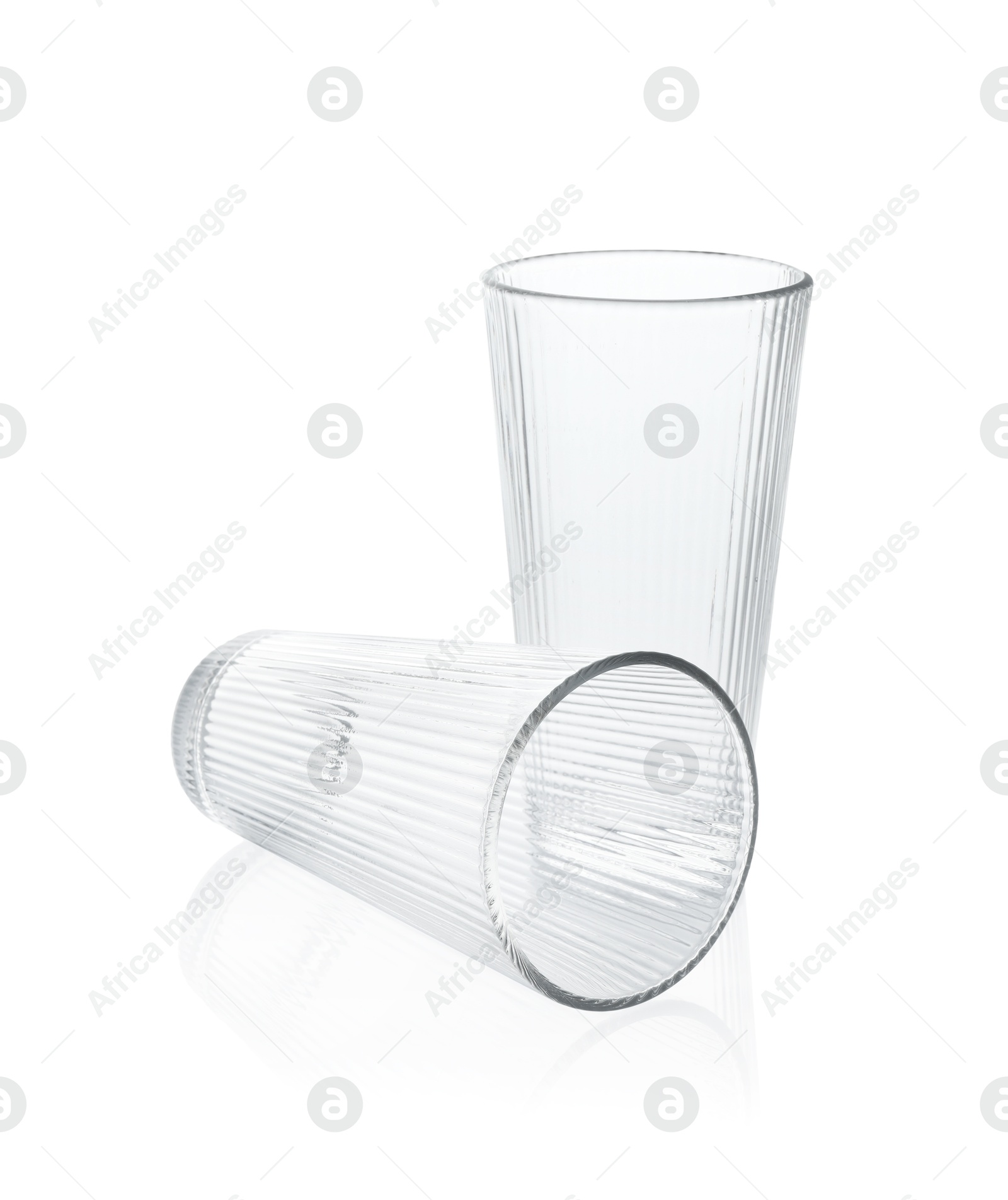 Photo of Two empty clean glasses isolated on white