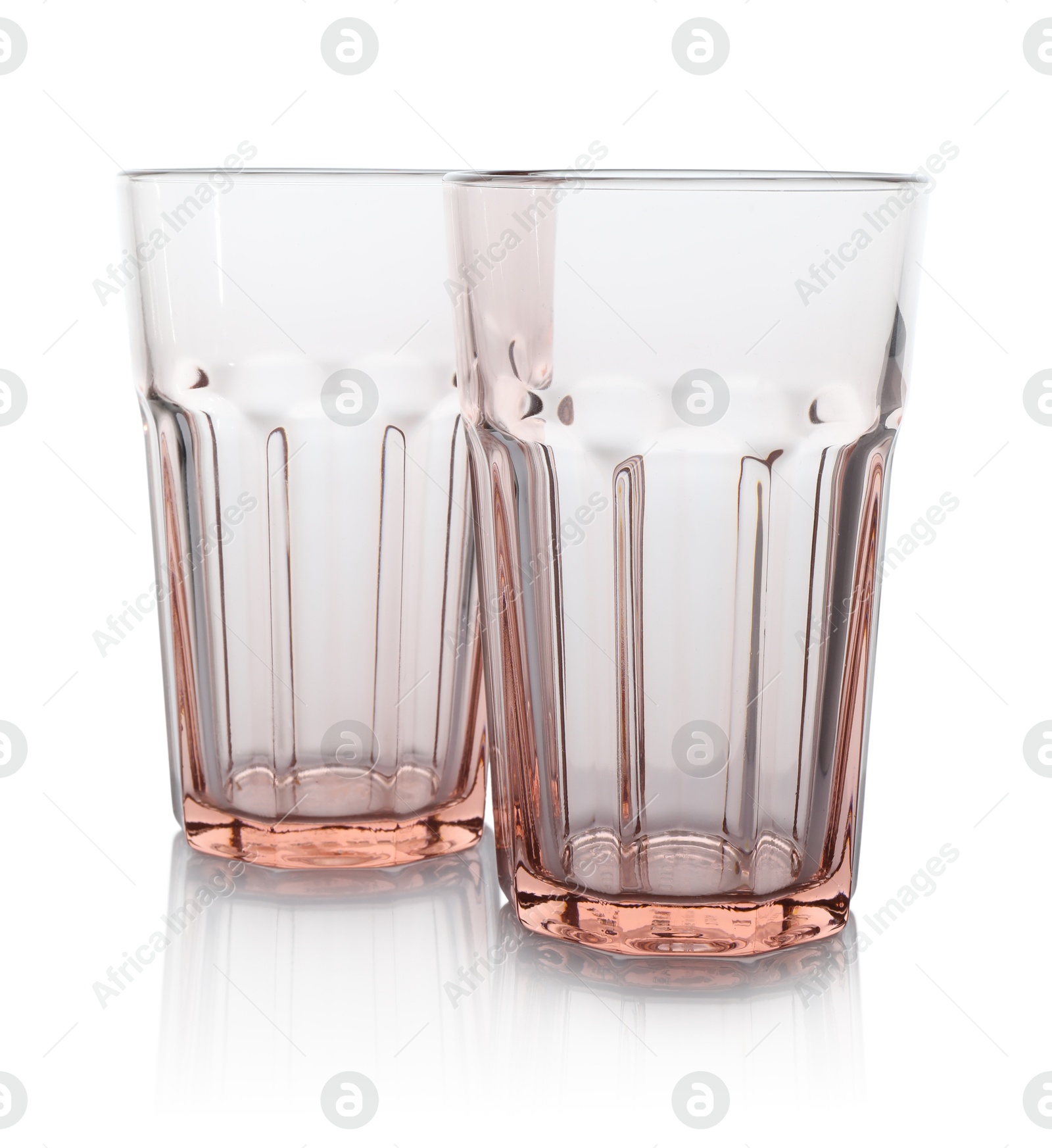 Photo of Two empty clean glasses isolated on white