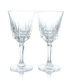 Photo of Two empty clean glasses isolated on white