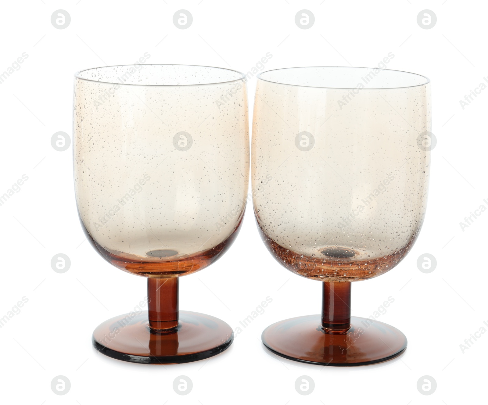 Photo of Two empty clean glasses isolated on white