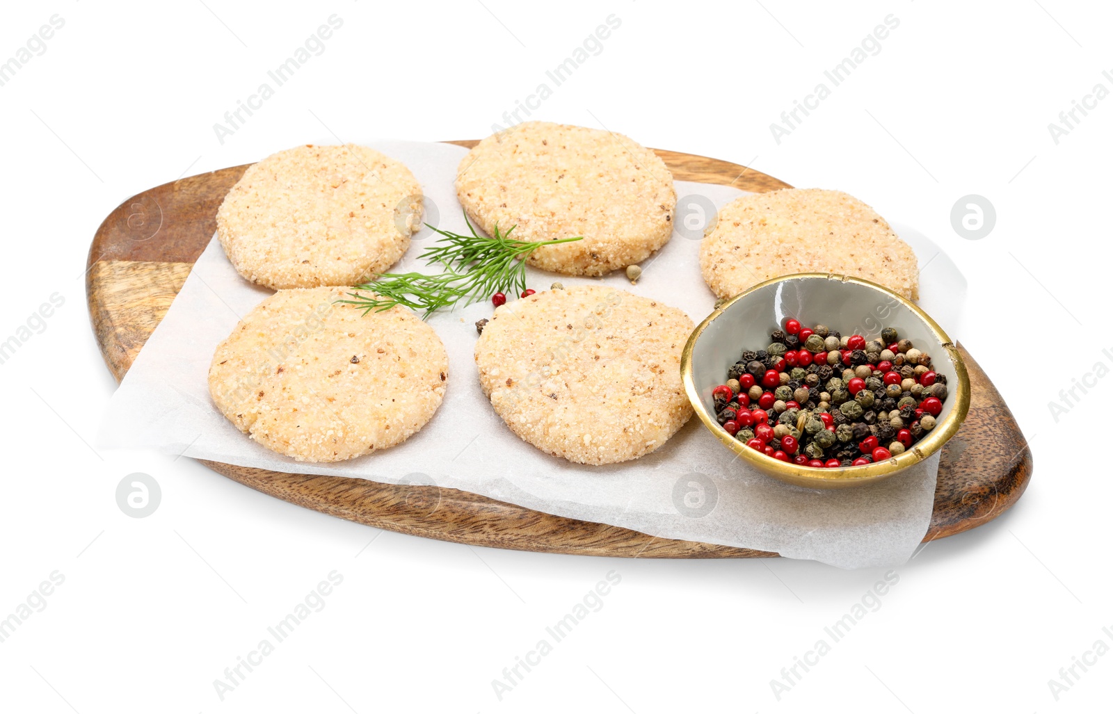 Photo of Many uncooked patties and spices isolated on white