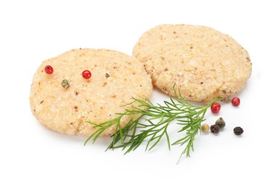 Photo of Uncooked patties and spices isolated on white