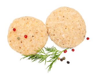 Photo of Uncooked patties and spices isolated on white, top view