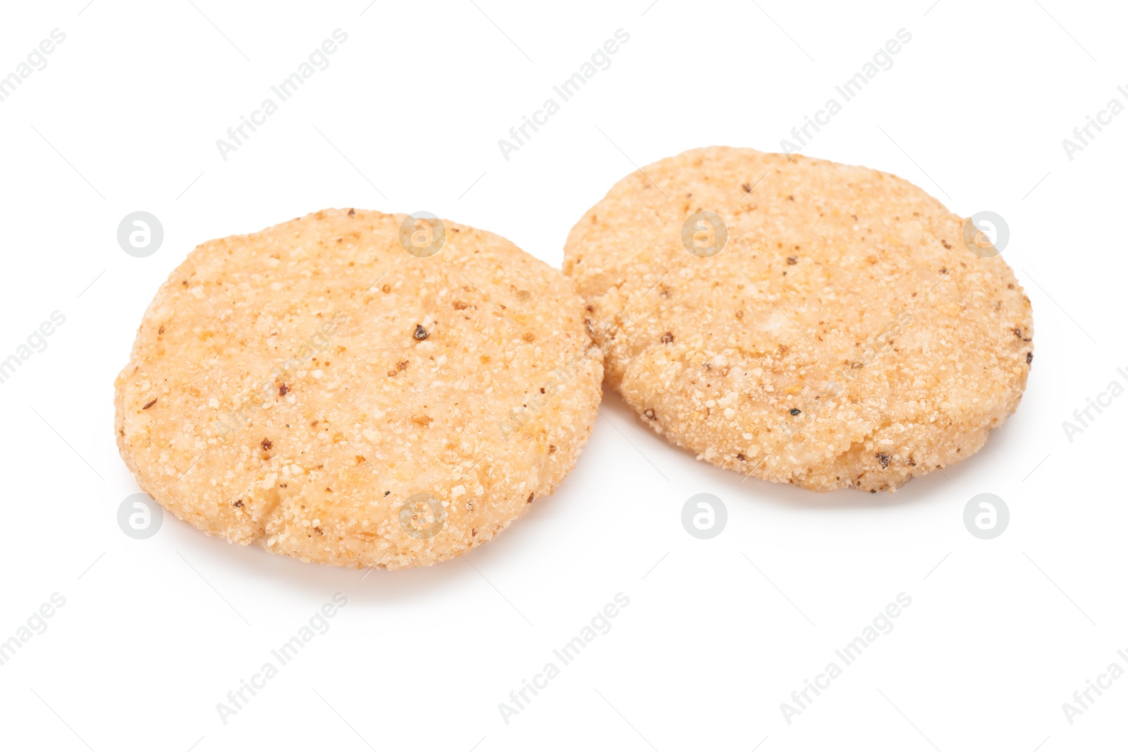 Photo of Two uncooked fresh patties isolated on white