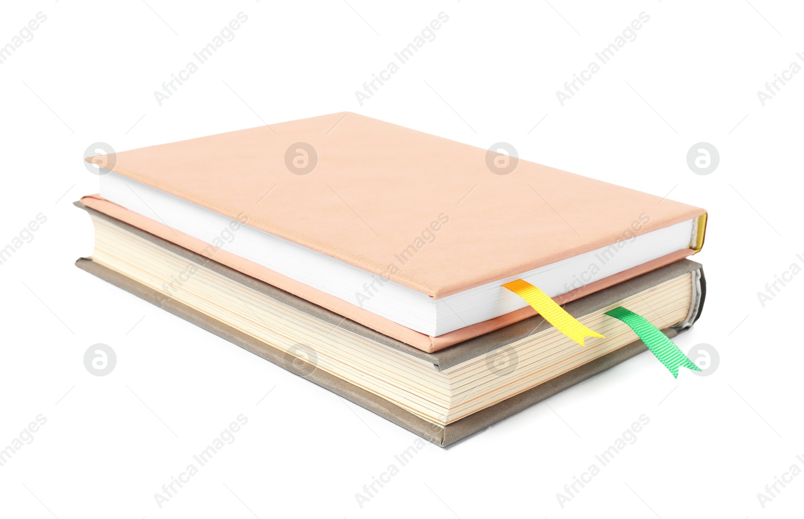 Photo of Books with ribbon bookmarks isolated on white