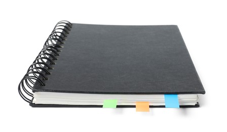 Photo of Notebook with colorful tabs isolated on white