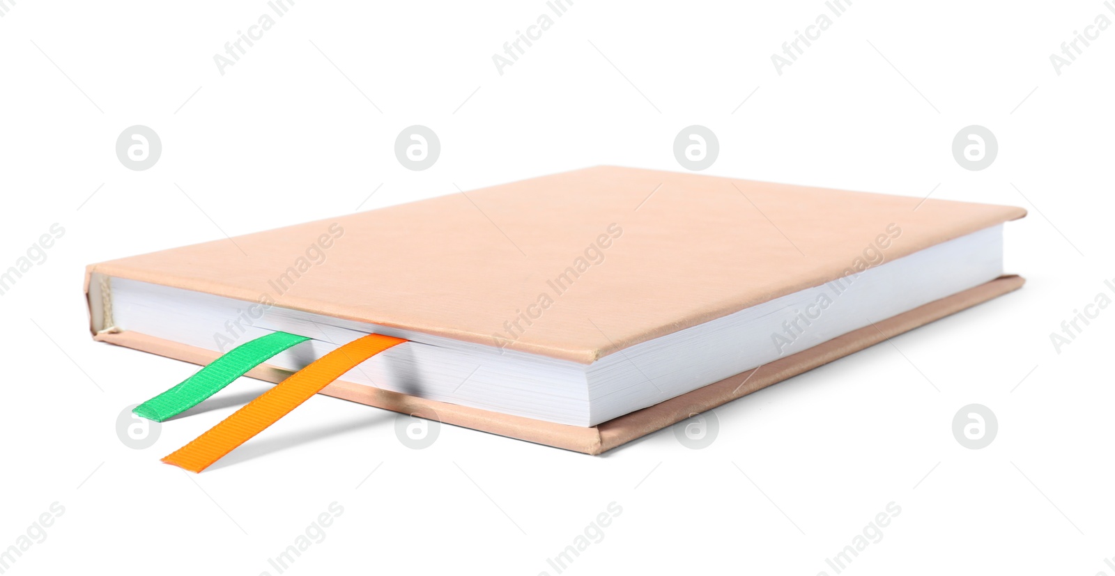 Photo of Book with ribbon bookmarks isolated on white