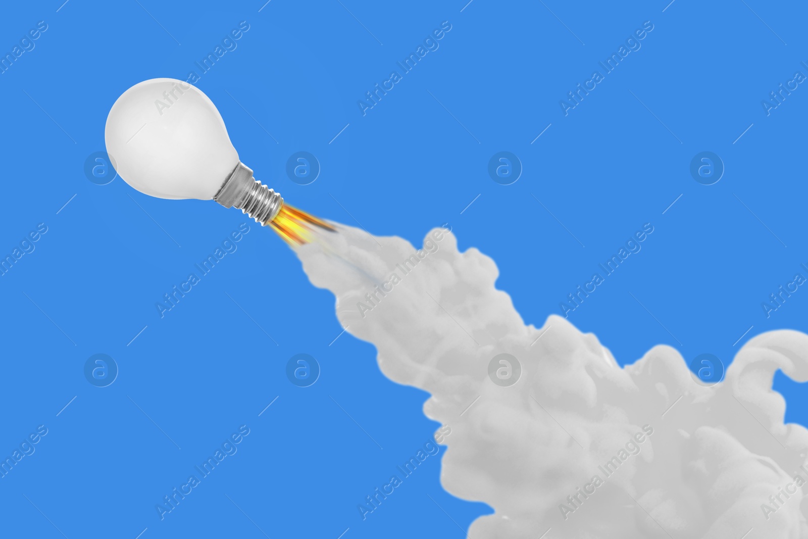 Image of Light bulb flying like rocket with smoke and fire on light blue background. Concepts of idea, startup, creativity, fast success