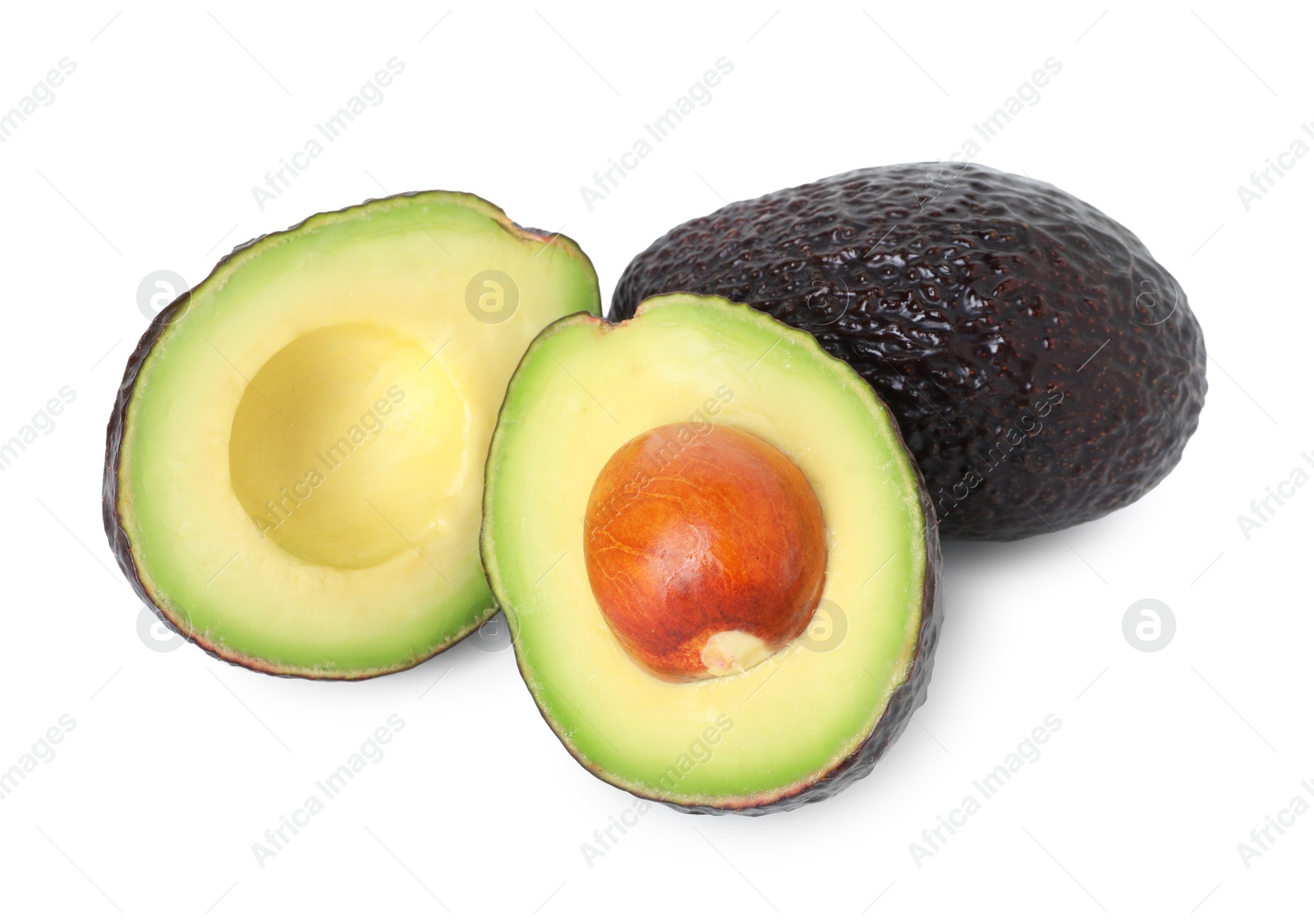 Photo of Whole and cut avocados isolated on white