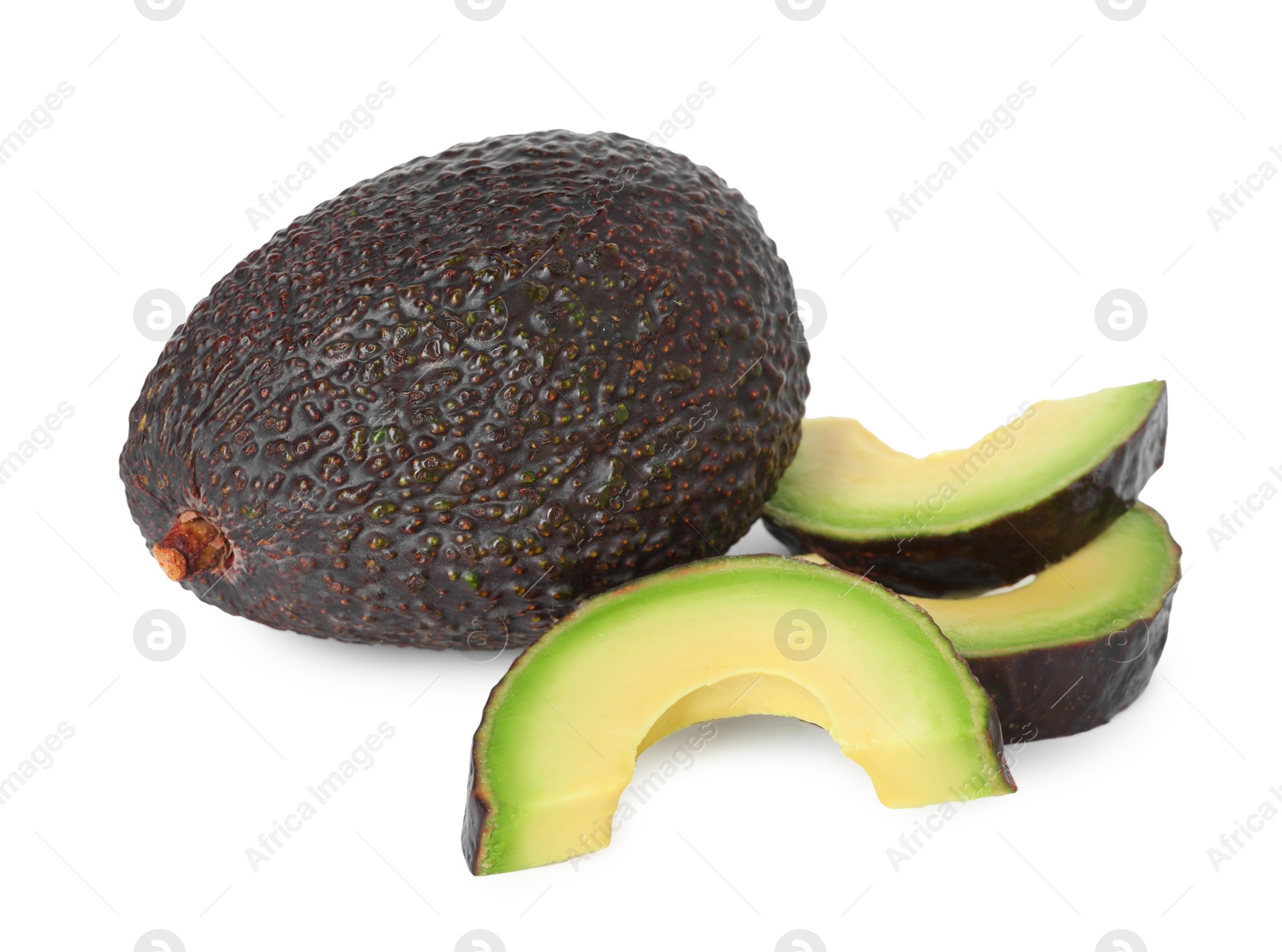 Photo of Whole and cut avocados isolated on white