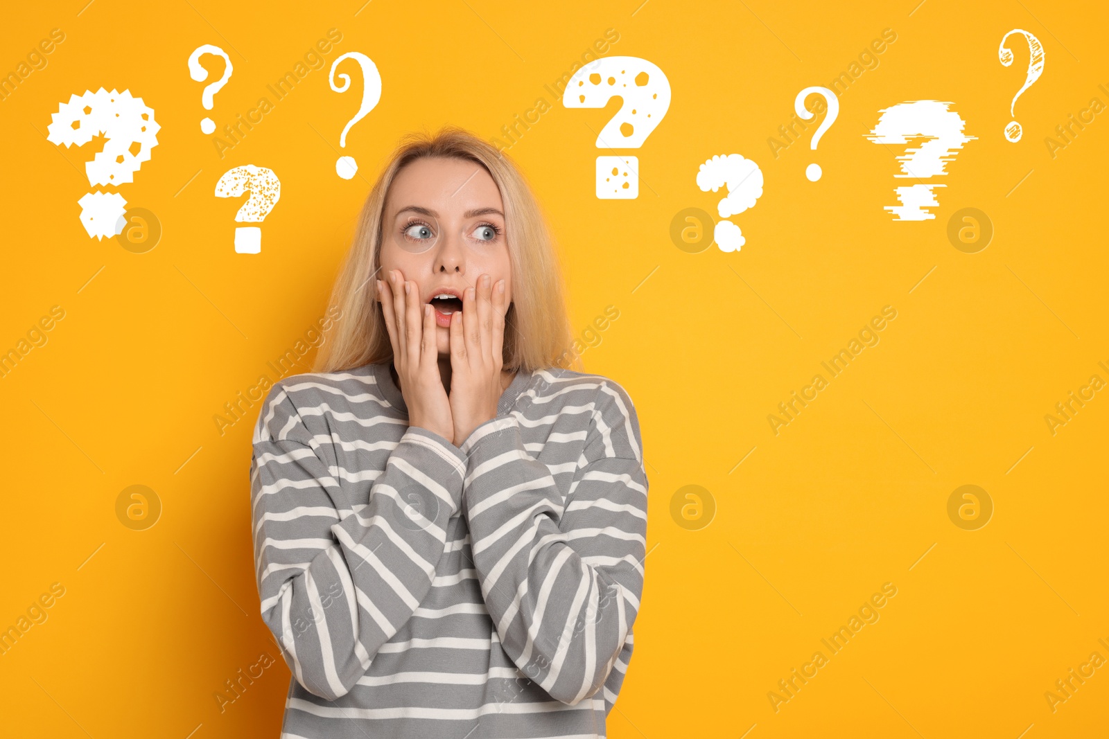 Image of Surprised woman on orange background. White question marks near her