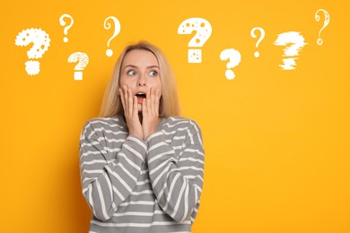 Image of Surprised woman on orange background. White question marks near her