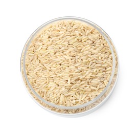 Photo of Raw brown rice in open jar isolated on white, top view