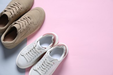 Photo of Sportive shoes. Different stylish sneakers on color background, flat lay. Space for text