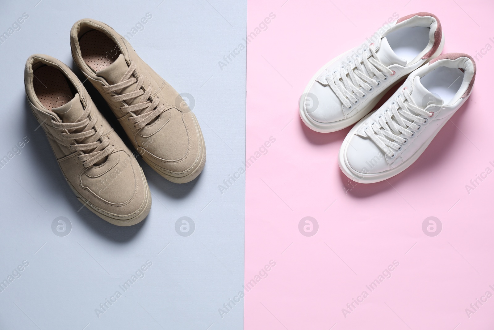 Photo of Sportive shoes. Different stylish sneakers on color background, flat lay. Space for text