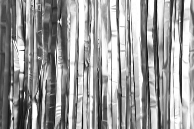 Photo of Shiny silver foil curtain as background, closeup