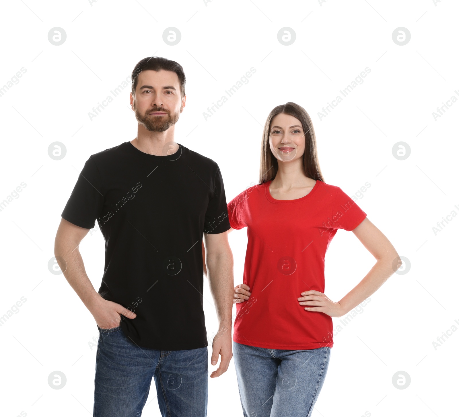 Photo of Woman and man wearing blank t-shirts on white background. Mockup for design