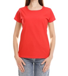 Photo of Woman wearing blank red t-shirt on white background, closeup. Mockup for design