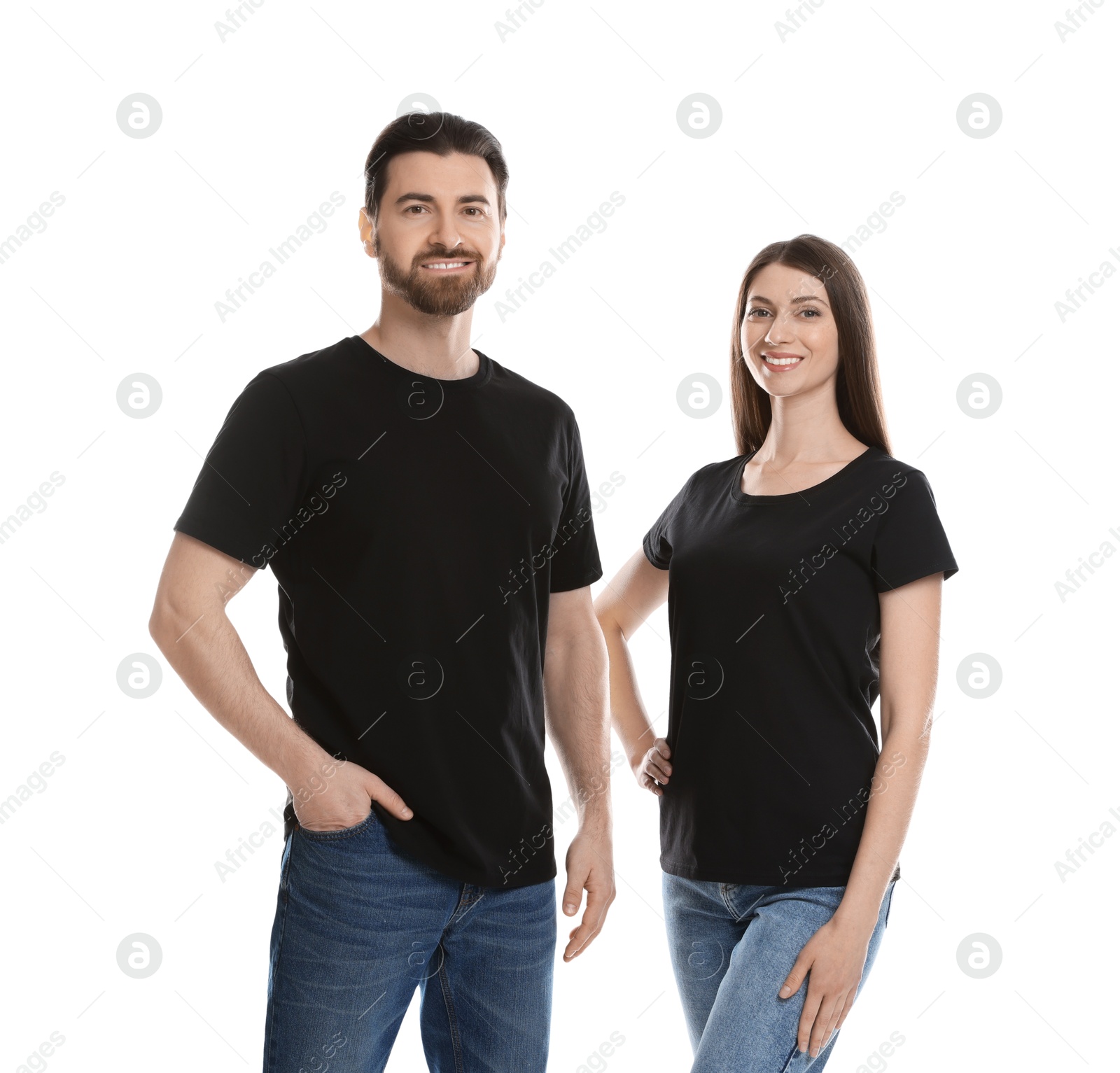 Photo of Woman and man wearing blank black t-shirts on white background. Mockup for design