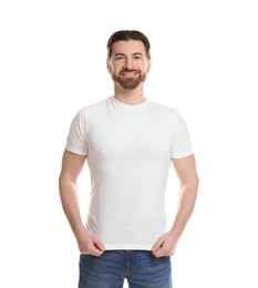 Photo of Man wearing blank t-shirt on white background. Mockup for design