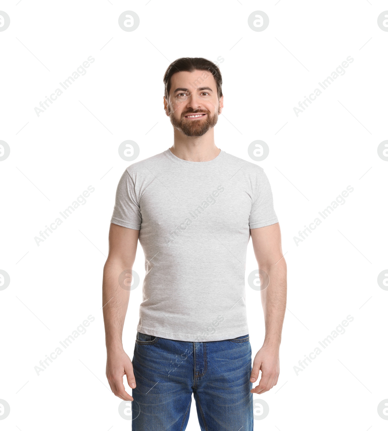 Photo of Man wearing blank t-shirt on white background. Mockup for design