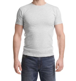 Photo of Man wearing blank t-shirt on white background, closeup. Mockup for design