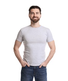 Photo of Man wearing blank t-shirt on white background. Mockup for design