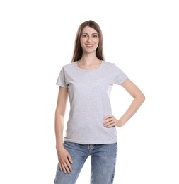 Photo of Woman wearing blank t-shirt on white background. Mockup for design