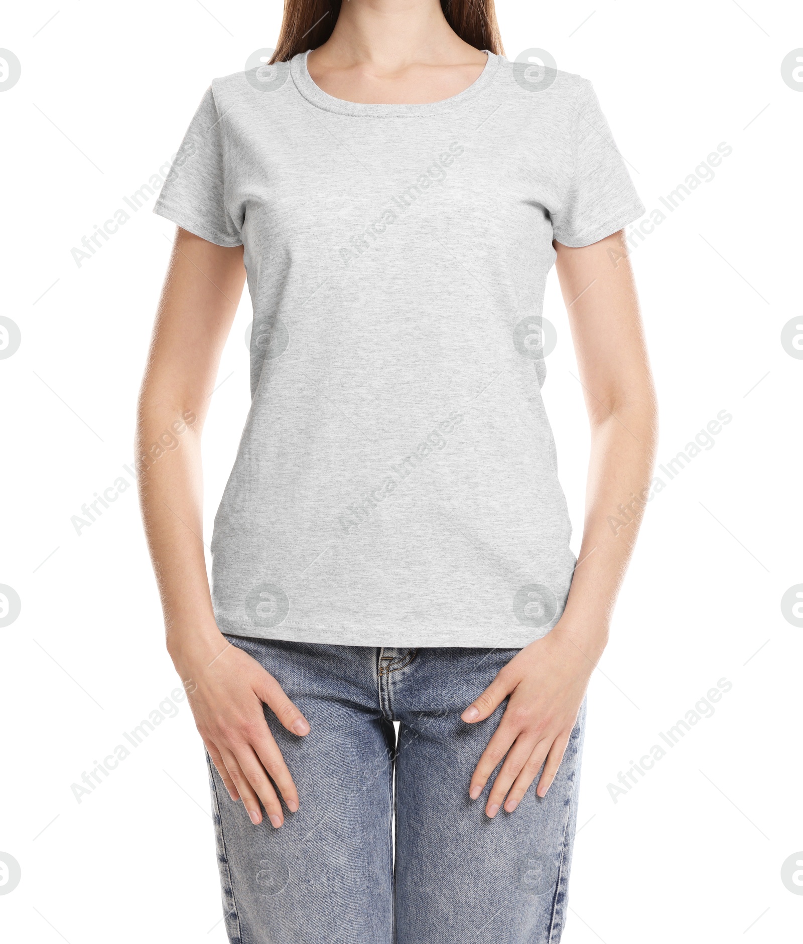 Photo of Woman wearing blank t-shirt on white background, closeup. Mockup for design