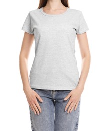 Photo of Woman wearing blank t-shirt on white background, closeup. Mockup for design