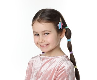 Photo of Little girl wearing beautiful hair accessories on white background