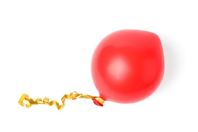 Photo of One red half deflated balloon isolated on white, top view