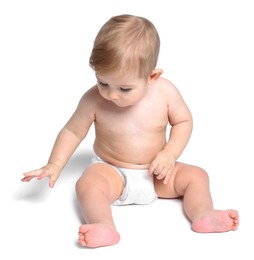 Photo of Cute little baby sitting on white background