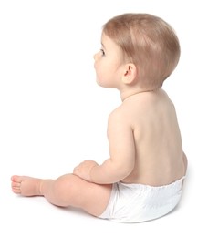 Cute little baby sitting on white background