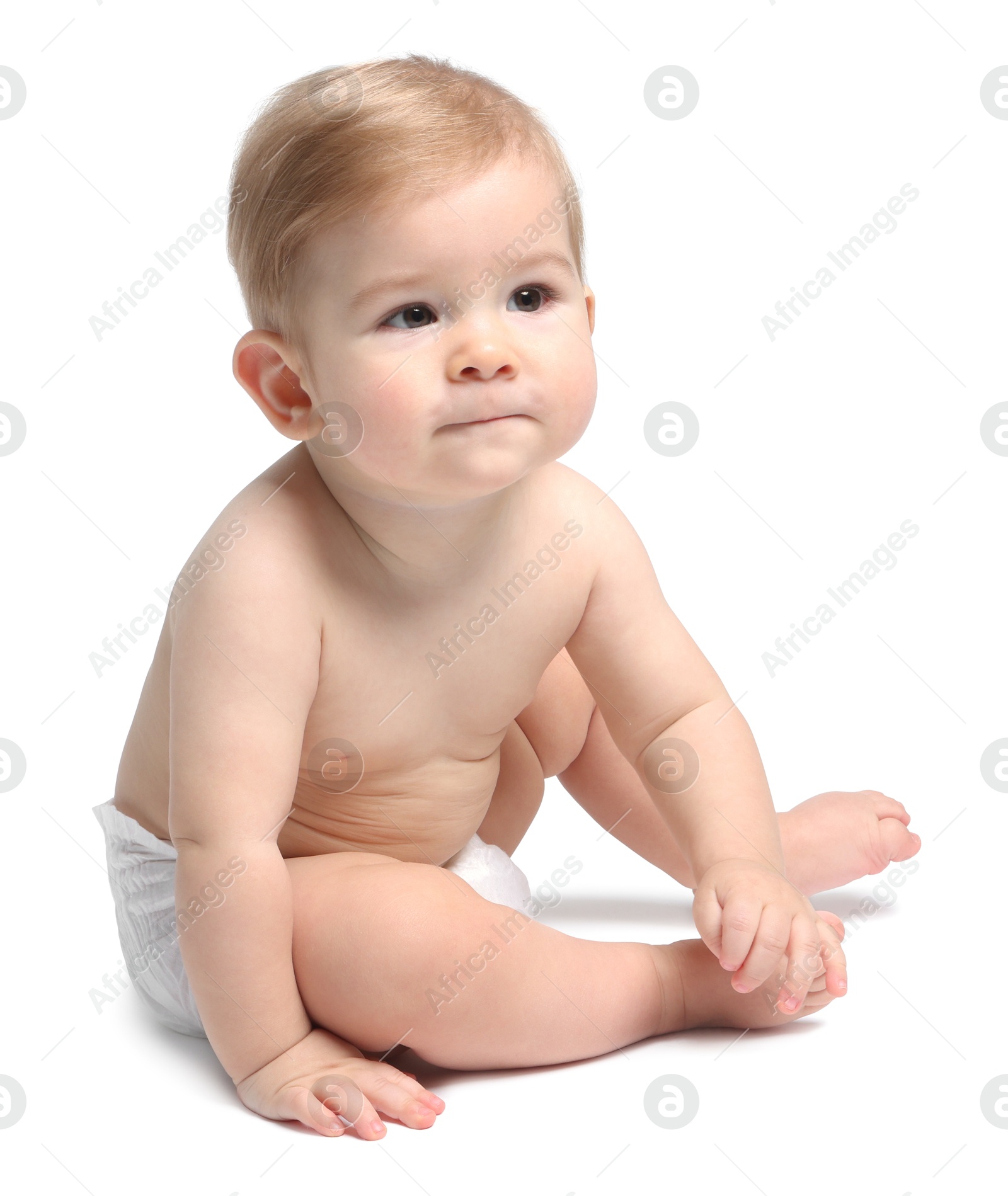 Photo of Cute little baby sitting on white background