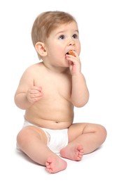 Cute little baby sitting on white background