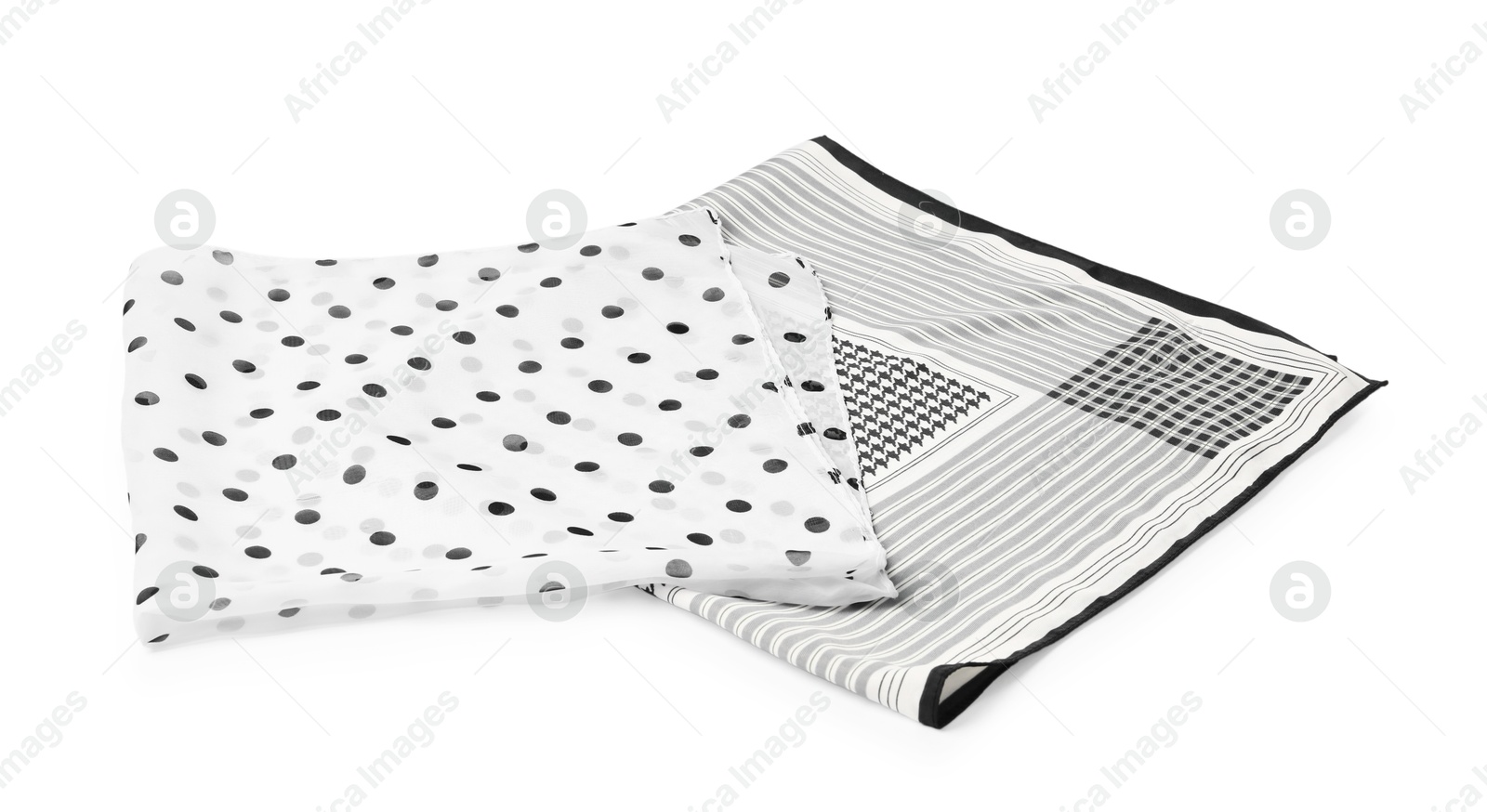 Photo of Beautiful handkerchiefs isolated on white. Stylish accessory