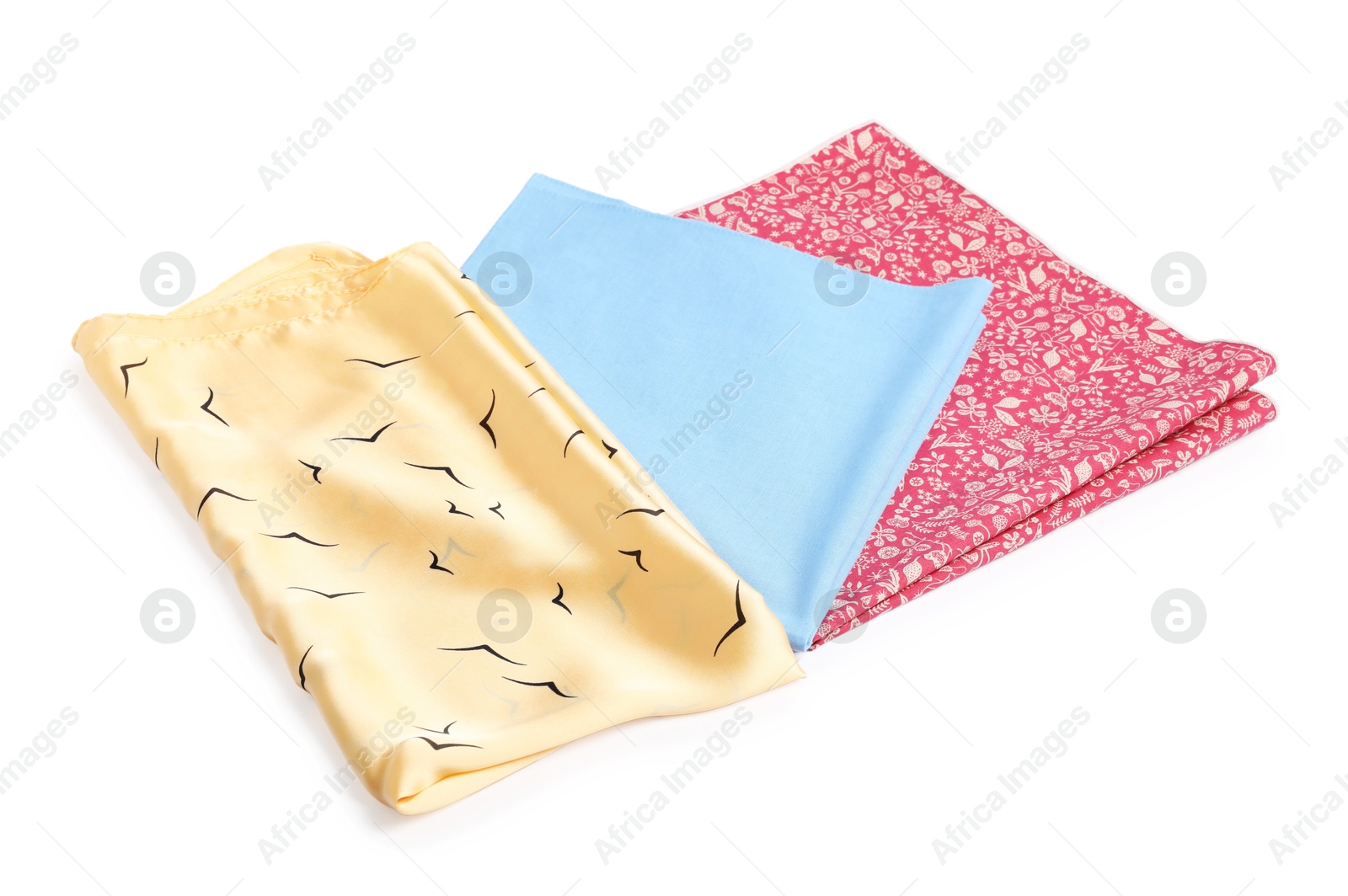 Photo of Beautiful handkerchiefs isolated on white. Stylish accessory