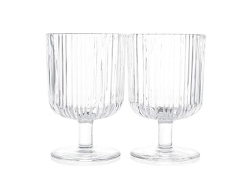 Photo of Two empty clean glasses isolated on white