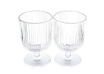 Photo of Two empty clean glasses isolated on white