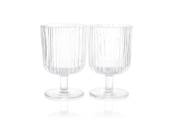 Photo of Two empty clean glasses isolated on white