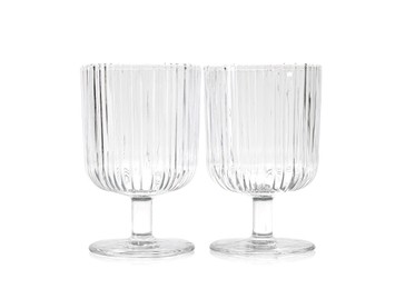 Photo of Two empty clean glasses isolated on white