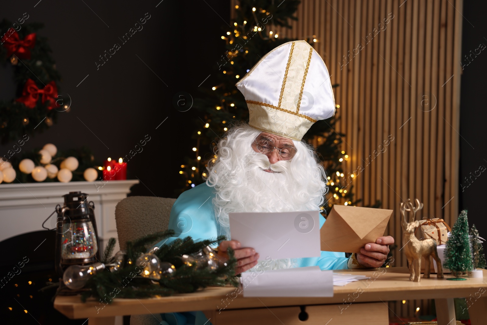 Photo of Saint Nicholas with letters in room decorated for Christmas